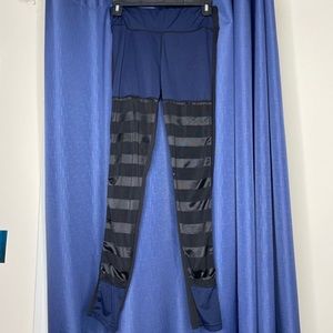 Blue and black leggings with mesh cut out